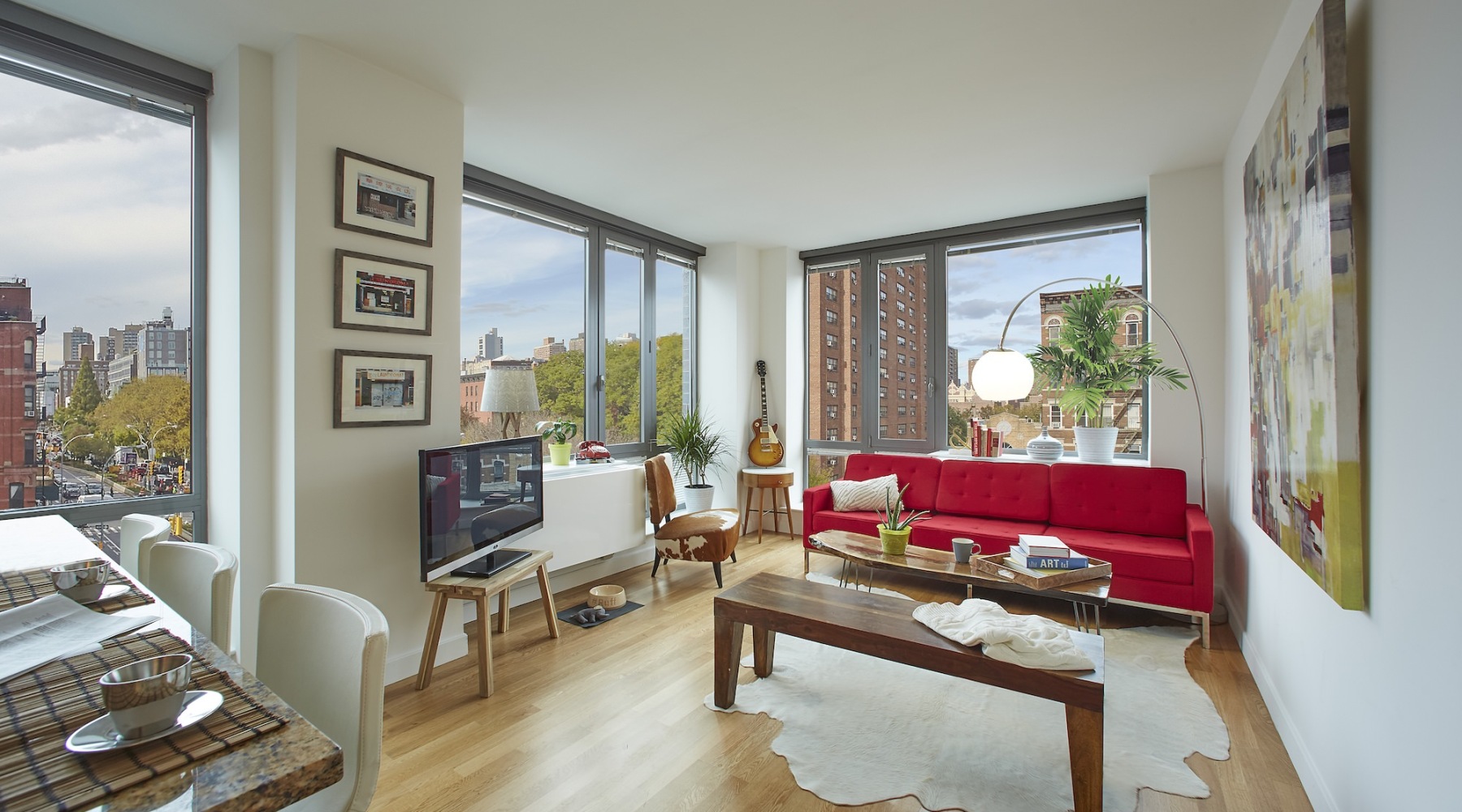 a modern looking bedroom with a large window