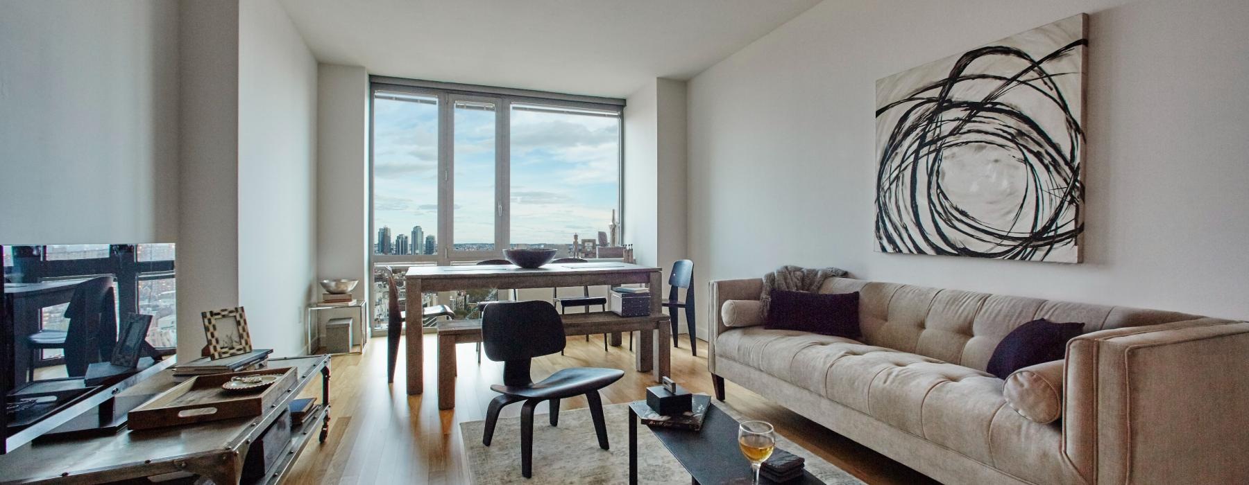 a living room with a couch and a table