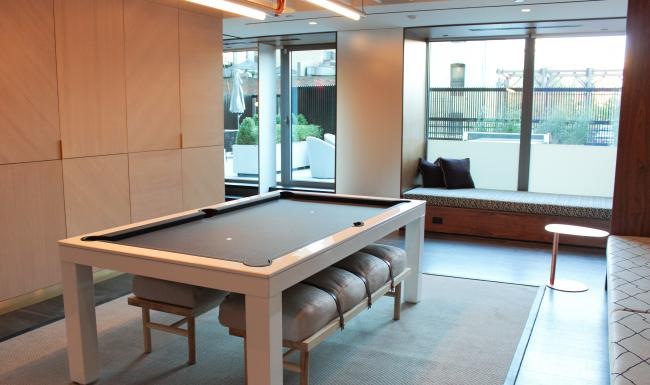 a room with a table and chairs